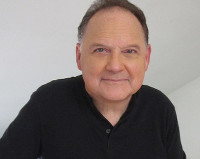 Stephen Furst.